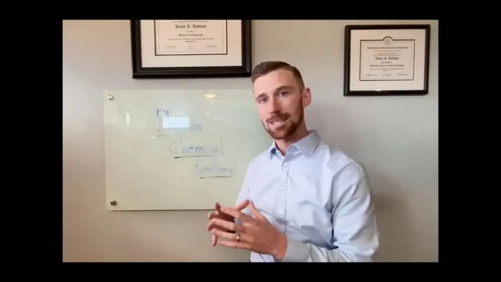 Dr. Holman discussing in a clinic