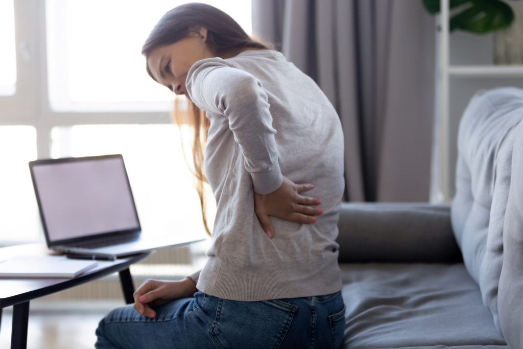 girl suffering back pain