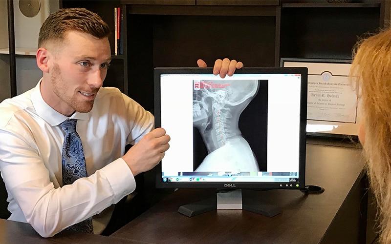 Dr. Holman showing neck xray